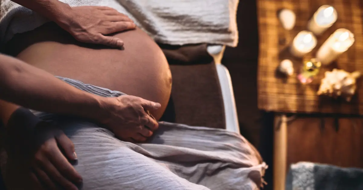 A woman getting a massage during pregnancy